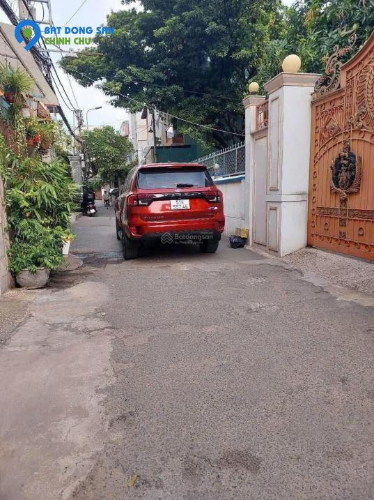 Bán nhà HXH đường Lê Quang Định Phường 7 - Bình Thạnh xây 4 tầng - sân để 2 ô tô